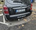 Черный Хендай Туксон, объемом двигателя 2 л и пробегом 250 тыс. км за 4450 $, фото 3 на Automoto.ua