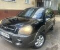 Черный Хендай Туксон, объемом двигателя 2 л и пробегом 272 тыс. км за 6425 $, фото 1 на Automoto.ua