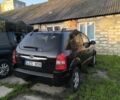 Черный Хендай Туксон, объемом двигателя 2 л и пробегом 200 тыс. км за 4200 $, фото 3 на Automoto.ua