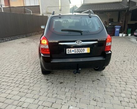 Черный Хендай Туксон, объемом двигателя 2 л и пробегом 276 тыс. км за 6950 $, фото 2 на Automoto.ua