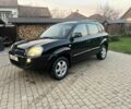 Черный Хендай Туксон, объемом двигателя 2 л и пробегом 276 тыс. км за 6950 $, фото 1 на Automoto.ua