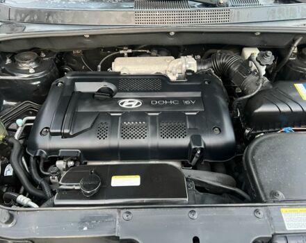 Черный Хендай Туксон, объемом двигателя 2 л и пробегом 276 тыс. км за 6950 $, фото 3 на Automoto.ua