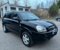Черный Хендай Туксон, объемом двигателя 2 л и пробегом 200 тыс. км за 2946 $, фото 1 на Automoto.ua