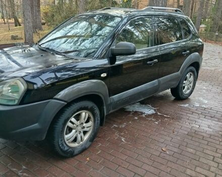 Черный Хендай Туксон, объемом двигателя 2 л и пробегом 320 тыс. км за 7000 $, фото 1 на Automoto.ua