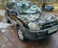 Черный Хендай Туксон, объемом двигателя 2 л и пробегом 320 тыс. км за 7000 $, фото 2 на Automoto.ua