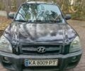 Черный Хендай Туксон, объемом двигателя 2 л и пробегом 320 тыс. км за 7000 $, фото 1 на Automoto.ua