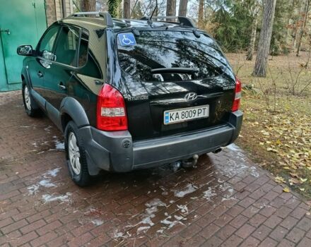 Черный Хендай Туксон, объемом двигателя 2 л и пробегом 320 тыс. км за 7000 $, фото 3 на Automoto.ua