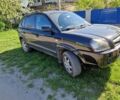 Чорний Хендай Туксон, об'ємом двигуна 2 л та пробігом 220 тис. км за 7300 $, фото 1 на Automoto.ua