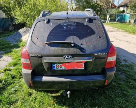 Чорний Хендай Туксон, об'ємом двигуна 2 л та пробігом 220 тис. км за 7300 $, фото 3 на Automoto.ua