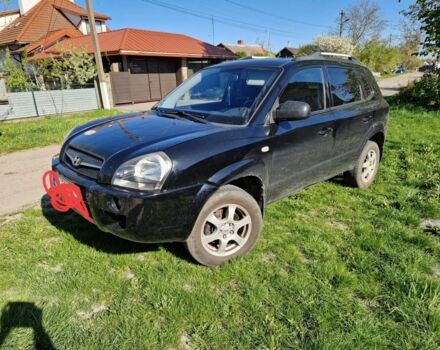 Чорний Хендай Туксон, об'ємом двигуна 2 л та пробігом 220 тис. км за 7300 $, фото 2 на Automoto.ua