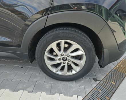 Чорний Хендай Туксон, об'ємом двигуна 2 л та пробігом 187 тис. км за 17000 $, фото 6 на Automoto.ua