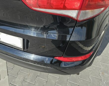 Чорний Хендай Туксон, об'ємом двигуна 2 л та пробігом 187 тис. км за 17000 $, фото 12 на Automoto.ua