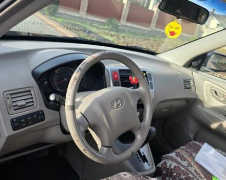 Черный Хендай Туксон, объемом двигателя 2 л и пробегом 217 тыс. км за 7195 $, фото 10 на Automoto.ua