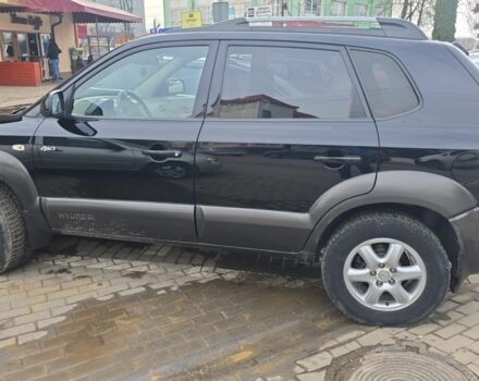 Черный Хендай Туксон, объемом двигателя 2 л и пробегом 217 тыс. км за 7195 $, фото 4 на Automoto.ua