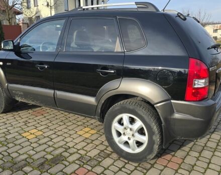 Черный Хендай Туксон, объемом двигателя 2 л и пробегом 217 тыс. км за 7195 $, фото 8 на Automoto.ua