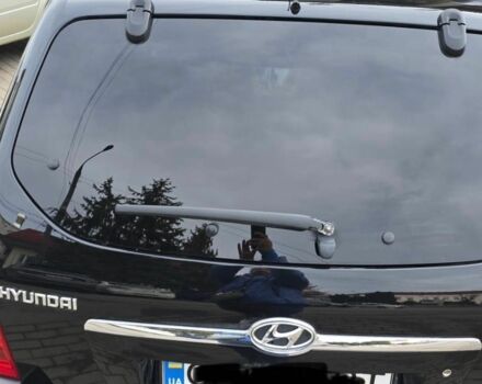 Черный Хендай Туксон, объемом двигателя 2 л и пробегом 217 тыс. км за 7195 $, фото 1 на Automoto.ua