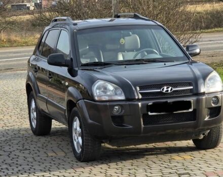 Черный Хендай Туксон, объемом двигателя 2 л и пробегом 217 тыс. км за 7195 $, фото 7 на Automoto.ua