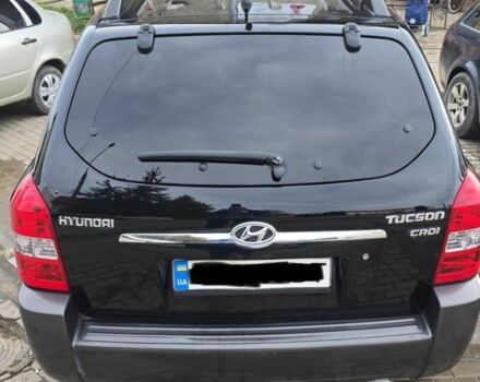 Черный Хендай Туксон, объемом двигателя 2 л и пробегом 217 тыс. км за 7195 $, фото 2 на Automoto.ua