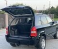 Черный Хендай Туксон, объемом двигателя 2 л и пробегом 250 тыс. км за 7950 $, фото 10 на Automoto.ua