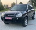 Черный Хендай Туксон, объемом двигателя 2 л и пробегом 250 тыс. км за 7950 $, фото 3 на Automoto.ua