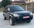 Черный Хендай Туксон, объемом двигателя 2 л и пробегом 250 тыс. км за 7950 $, фото 1 на Automoto.ua