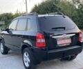 Черный Хендай Туксон, объемом двигателя 2 л и пробегом 250 тыс. км за 7950 $, фото 8 на Automoto.ua