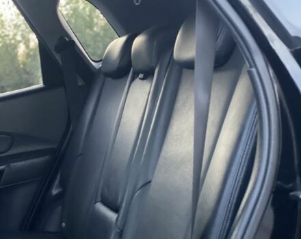 Черный Хендай Туксон, объемом двигателя 2 л и пробегом 250 тыс. км за 7950 $, фото 12 на Automoto.ua