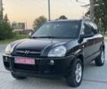 Черный Хендай Туксон, объемом двигателя 2 л и пробегом 250 тыс. км за 7950 $, фото 2 на Automoto.ua