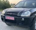 Черный Хендай Туксон, объемом двигателя 2 л и пробегом 250 тыс. км за 7950 $, фото 4 на Automoto.ua