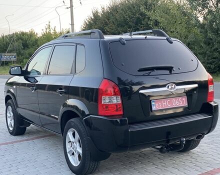 Черный Хендай Туксон, объемом двигателя 2 л и пробегом 250 тыс. км за 7950 $, фото 7 на Automoto.ua