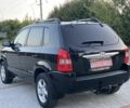 Черный Хендай Туксон, объемом двигателя 2 л и пробегом 250 тыс. км за 7950 $, фото 7 на Automoto.ua