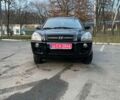 Черный Хендай Туксон, объемом двигателя 2 л и пробегом 170 тыс. км за 4500 $, фото 1 на Automoto.ua