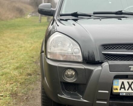 Черный Хендай Туксон, объемом двигателя 2 л и пробегом 220 тыс. км за 7000 $, фото 9 на Automoto.ua