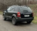 Черный Хендай Туксон, объемом двигателя 2 л и пробегом 220 тыс. км за 7000 $, фото 5 на Automoto.ua