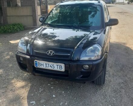 Черный Хендай Туксон, объемом двигателя 2 л и пробегом 500 тыс. км за 6500 $, фото 1 на Automoto.ua