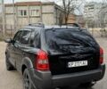 Черный Хендай Туксон, объемом двигателя 2 л и пробегом 211 тыс. км за 8900 $, фото 7 на Automoto.ua