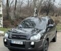 Черный Хендай Туксон, объемом двигателя 2 л и пробегом 211 тыс. км за 8900 $, фото 1 на Automoto.ua
