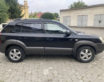 Чорний Хендай Туксон, об'ємом двигуна 2 л та пробігом 248 тис. км за 6500 $, фото 2 на Automoto.ua