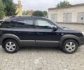 Чорний Хендай Туксон, об'ємом двигуна 2 л та пробігом 248 тис. км за 6500 $, фото 2 на Automoto.ua