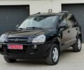 Черный Хендай Туксон, объемом двигателя 2 л и пробегом 237 тыс. км за 7700 $, фото 1 на Automoto.ua