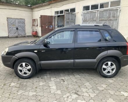 Чорний Хендай Туксон, об'ємом двигуна 2 л та пробігом 248 тис. км за 6500 $, фото 1 на Automoto.ua