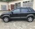 Чорний Хендай Туксон, об'ємом двигуна 2 л та пробігом 248 тис. км за 6500 $, фото 1 на Automoto.ua