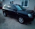 Чорний Хендай Туксон, об'ємом двигуна 2 л та пробігом 228 тис. км за 8600 $, фото 7 на Automoto.ua