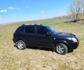 Черный Хендай Туксон, объемом двигателя 2 л и пробегом 228 тыс. км за 8600 $, фото 1 на Automoto.ua