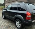 Чорний Хендай Туксон, об'ємом двигуна 2 л та пробігом 175 тис. км за 8200 $, фото 3 на Automoto.ua