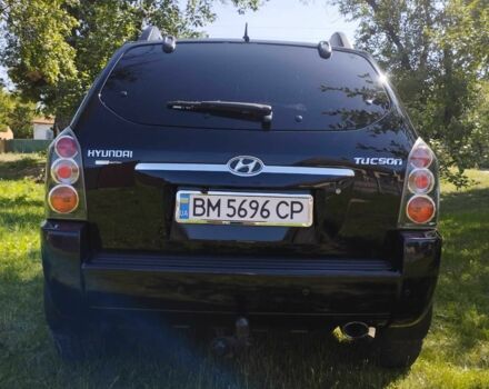 Черный Хендай Туксон, объемом двигателя 2 л и пробегом 230 тыс. км за 8200 $, фото 5 на Automoto.ua