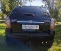 Черный Хендай Туксон, объемом двигателя 2 л и пробегом 230 тыс. км за 8200 $, фото 5 на Automoto.ua
