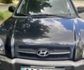 Чорний Хендай Туксон, об'ємом двигуна 2 л та пробігом 290 тис. км за 6495 $, фото 1 на Automoto.ua