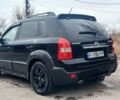 Черный Хендай Туксон, объемом двигателя 2 л и пробегом 191 тыс. км за 7600 $, фото 3 на Automoto.ua