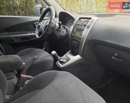 Черный Хендай Туксон, объемом двигателя 2 л и пробегом 167 тыс. км за 7900 $, фото 2 на Automoto.ua